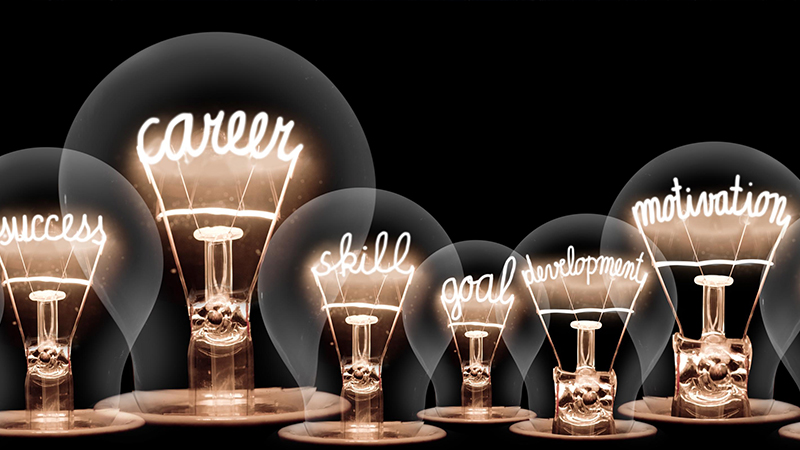 Lightbulbs with lit words insite